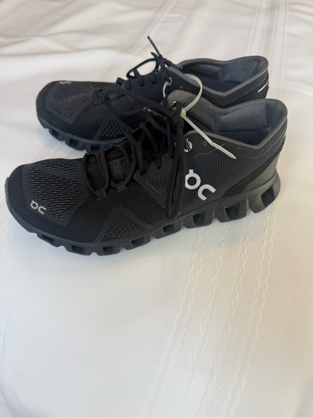 On Running Black Athletic Mesh Runners with Gray Accents